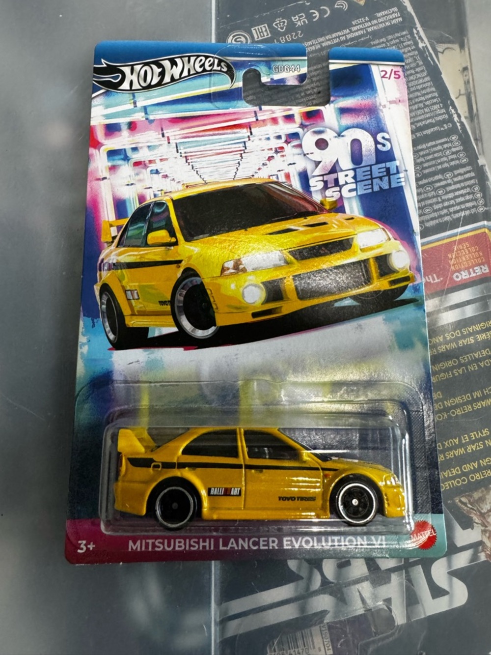 Hot Wheels Yellow Mitsubishi Lancer Evolution VI Toy Car